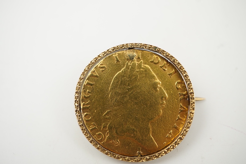 British gold coins, George III, gold guinea, 1794, in a swivel mount, plug at 12 o’clock position, otherwise good